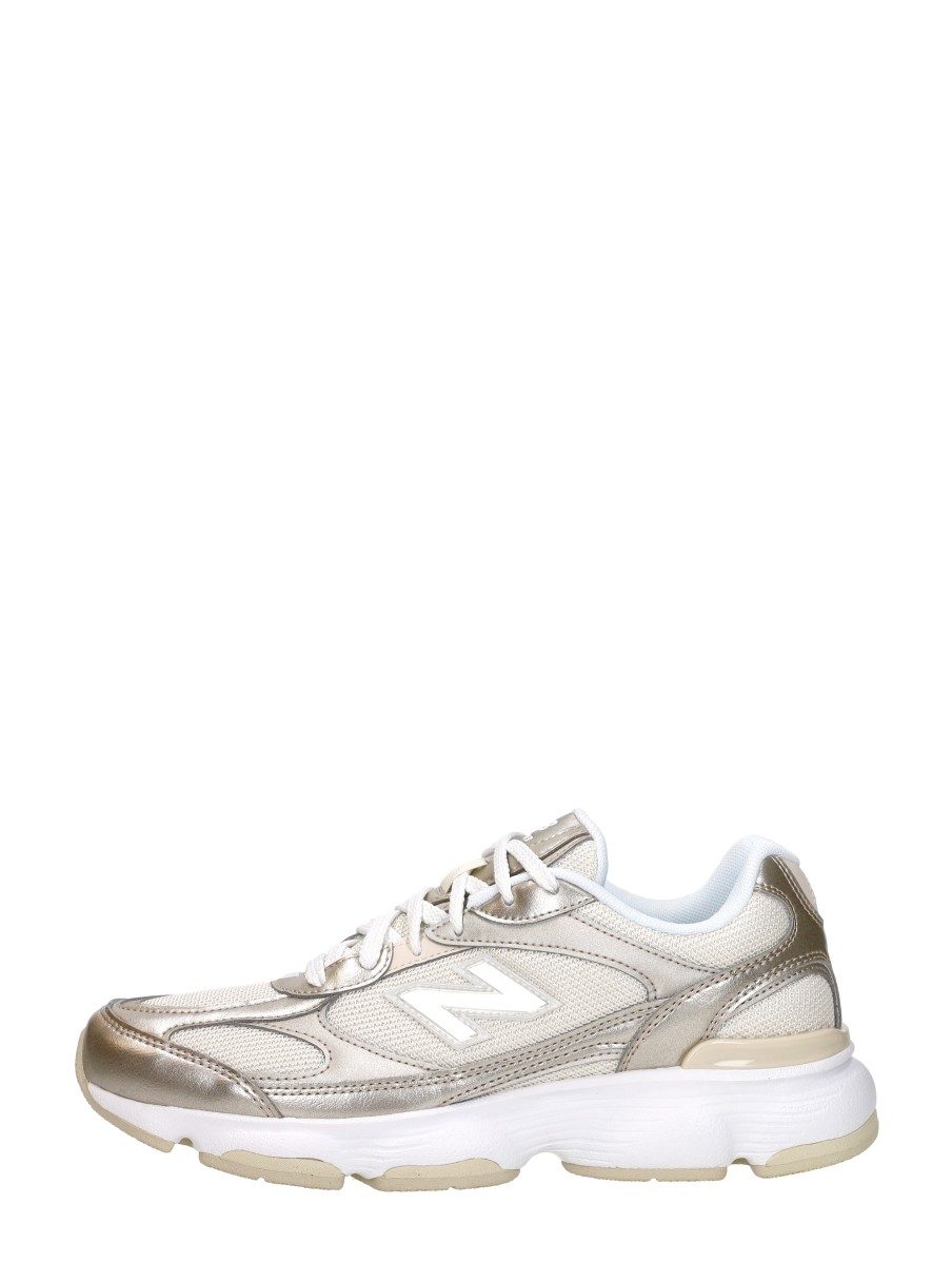 New Balance - 603 – goudkleur