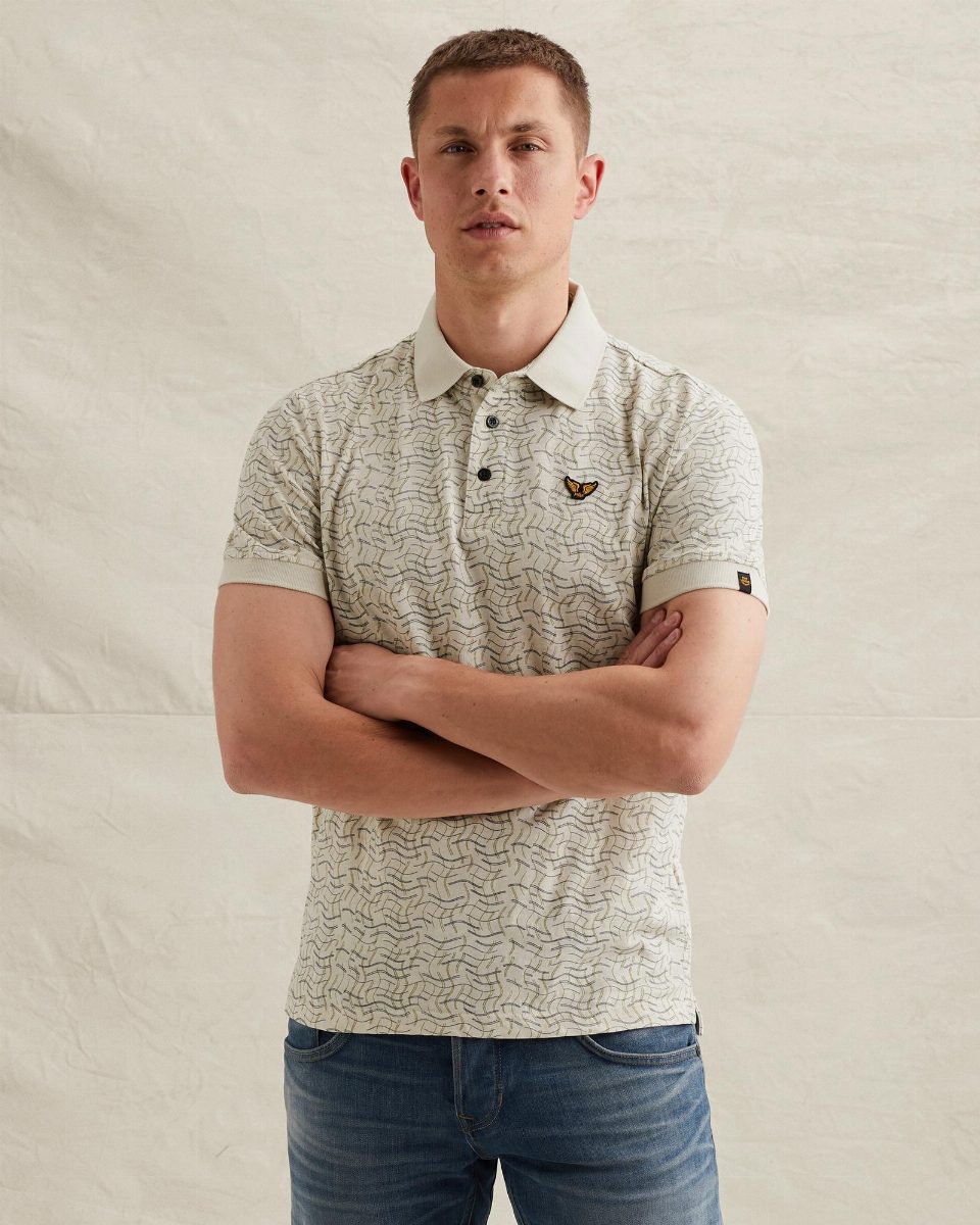 Polo van 100% katoen met allover print – bone white