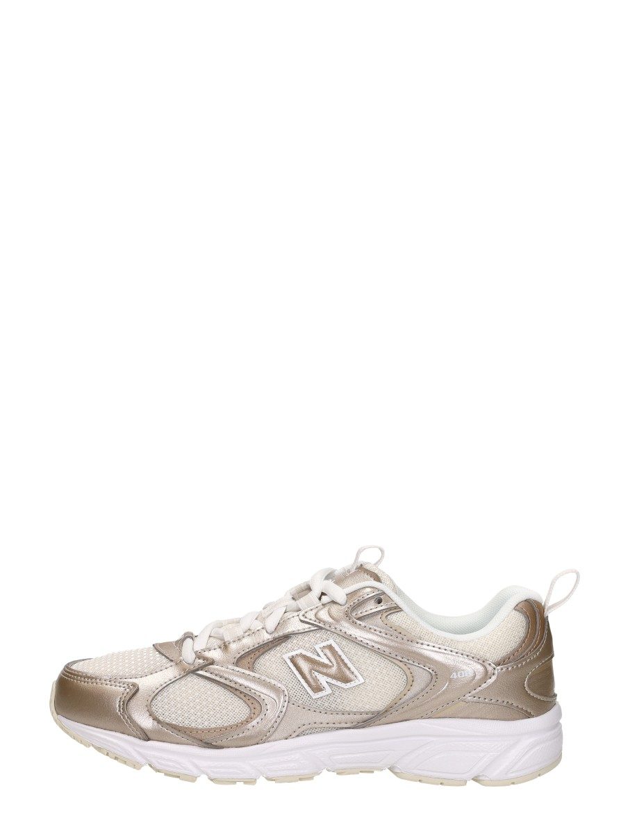 New Balance - 408 – goudkleur