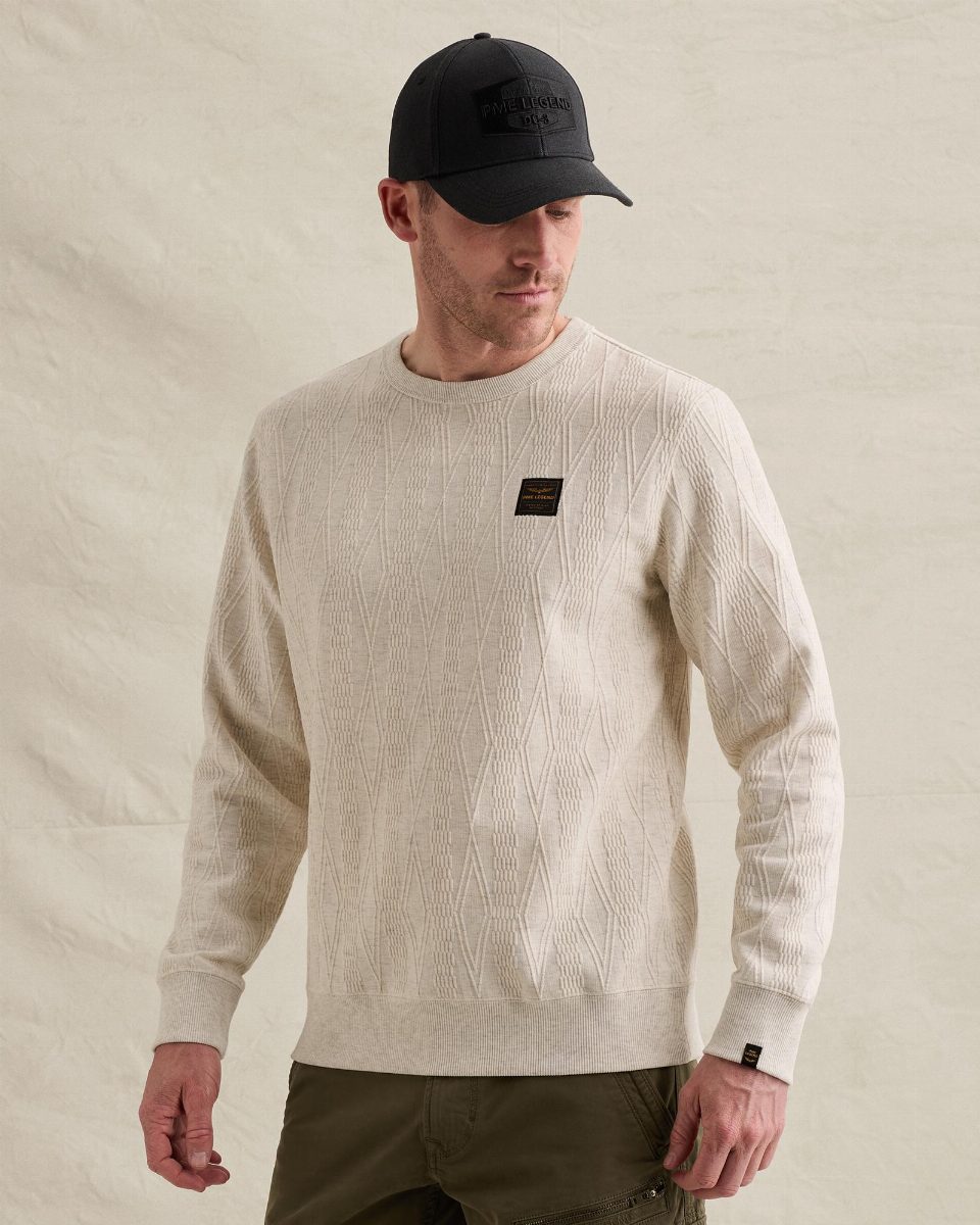 Sweatshirt met allover jacquardpatroon en badge – bone white melee