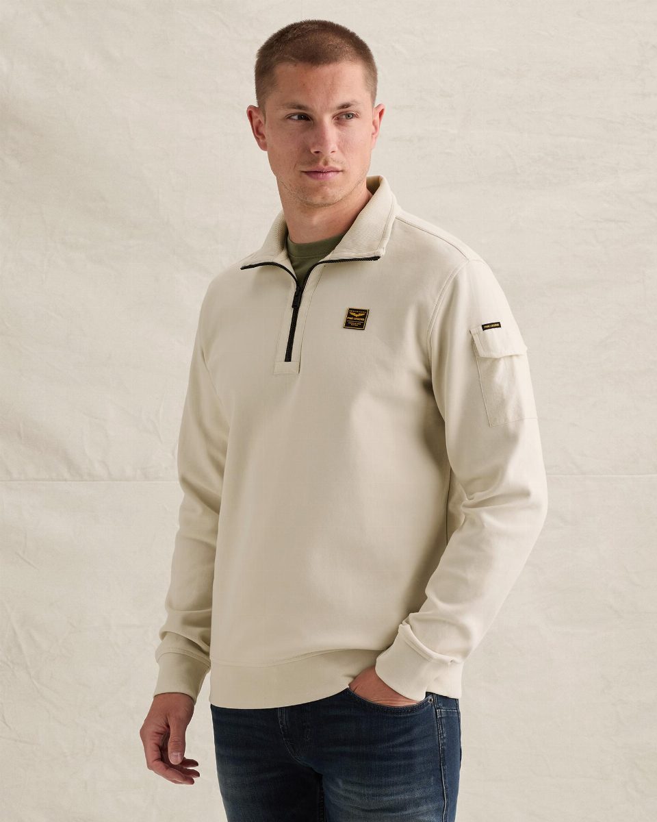 Sweatshirt met halve rits en badge – bone white