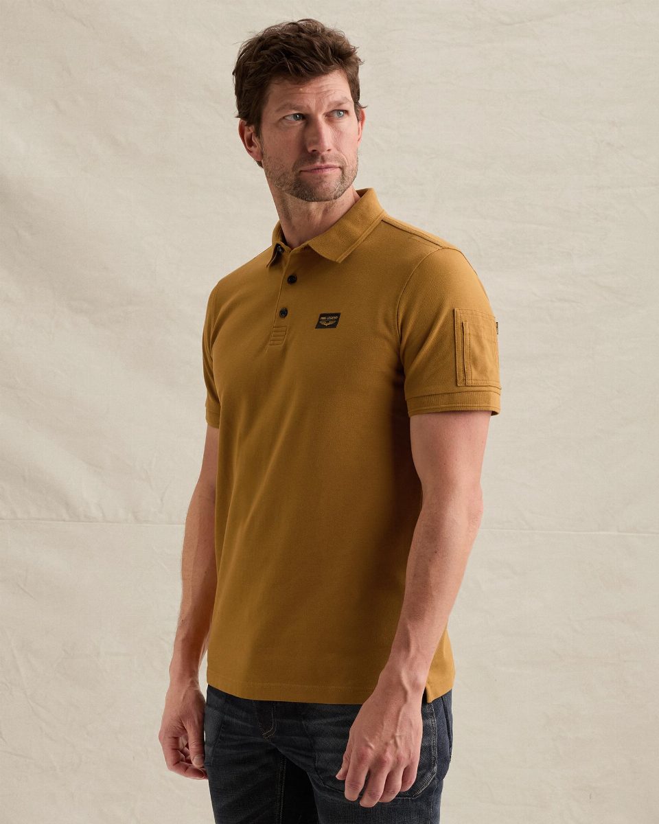 American Classic polo met flight pocket – golden brown